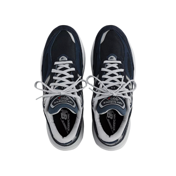 A pair of NEW BALANCE Mens 990 V6 Wide Navy athletic shoes, shown from above, feature navy and gray colors with white laces and mesh fabric on the toes.