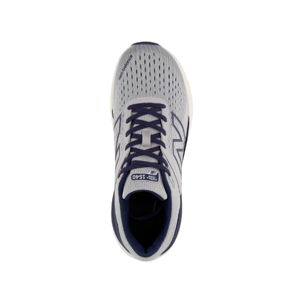 Top view of the New Balance Mens Fresh Foam X 1540v4 Wide in Grey/White, featuring navy accents, breathable mesh upper with perforations, and ROLLBAR stability tech for comfort and support. 1540 is labeled on the tongue. Brand: NEW BALANCE.