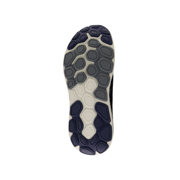 The image shows the sole of the New Balance Mens Fresh Foam X 1540v4 Wide Grey/White with a hexagonal, irregular pattern in black, gray, and white, highlighting Fresh Foam X cushioning on a white background.