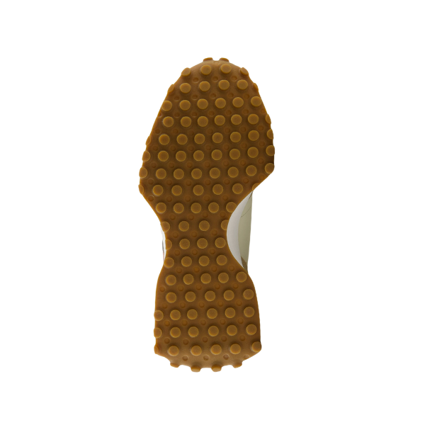 Bottom view of the New Balance Womens 327 Brown/White sneaker by NEW BALANCE, featuring a light brown rubber sole with large, round grip studs spaced evenly for enhanced traction.
