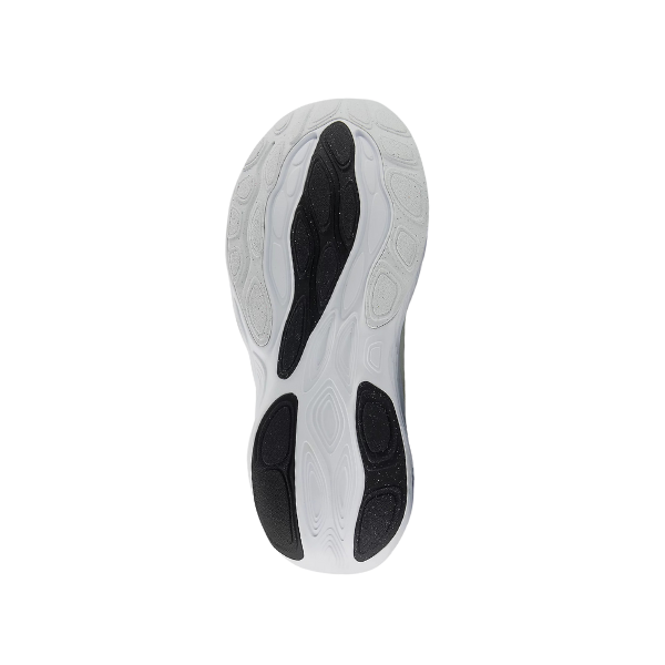 The image shows the sole of the NEW BALANCE Womens Fresh Foam X 1080v14 Wide White/Gold running shoe, featuring a white and black wavy tread with textured grip zones and Fresh Foam X cushioning, viewed from below on a white background.
