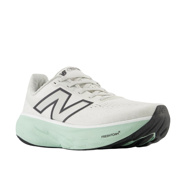 The New Balance Womens Fresh Foam X 1080v14 Wide in White/Green features Fresh Foam X cushioning, black accents, and the iconic N logo, shown from a front-side angle on a white background.