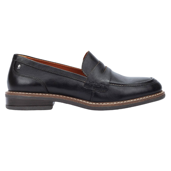The PIKOLINOS Aldaya Womens black leather loafer features a low heel, brown stitching, and a penny slot, shown in side profile against a white background.