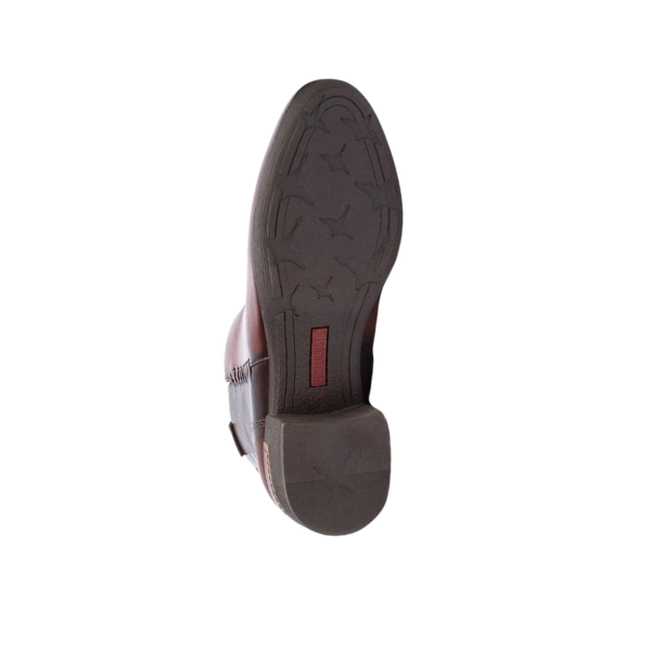 The PIKOLINOS Womens Malaga Cognac calfskin leather shoe is shown from the bottom, highlighting its textured sole with star and groove patterns plus a red rectangle near the heel. The background is plain white.