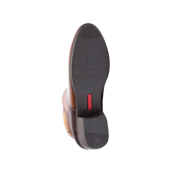 Sole view of the PIKOLINOS Womens Daroca Cuero ankle boot in brown, featuring a textured dark rubber sole and a red rectangular detail near the arch, set against a white background.