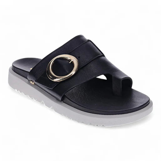 The REVERE Revere Womens Biscay Black is a black open-toe comfort sandal with a thick strap, large gold buckle, and white ridged sole—designed for stylish support.