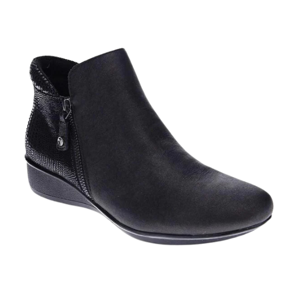 The Revere Womens Damascus Bootie Wide Black by REVERE features a low wedge heel, side zipper, textured back, and subtle arch support. Displayed on a white background.