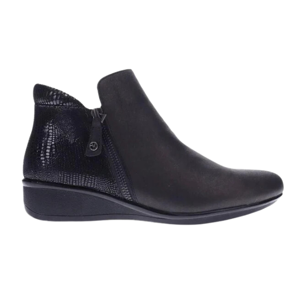 The REVERE Revere Womens Damascus Bootie Wide Black is a sleek black leather bootie with a low wedge heel, side zipper, textured ankle and heel detail, plus excellent arch support for all-day comfort.