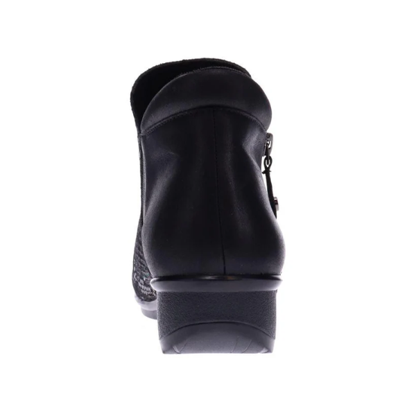 Rear view of the REVERE Womens Damascus Bootie Wide Black—an ankle boot with a low wedge heel, side zipper, and enhanced arch support—pictured on a white background.
