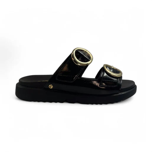 The REVERE Womens Mermaid Black sandal features two Wide black leather straps with large gold buckles and an adjustable fit, all set on a thick, ridged sole for comfort and style.