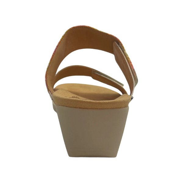 The REVERE Revere Womens Sorrento White sandal is shown from the back, featuring white wedge heel, cushioned insole, and two supportive straps for foot pain relief against a white background.