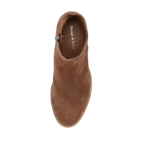 Top view of the Django & Juliette Womens Mockas Chocolate Suede ankle boot, featuring white stitching along the sole, a side zipper, and DJANGO & JULIETT branding inside.