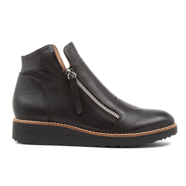 The Django & Juliette Womens Ohmy Black/Black bootie features a side zipper, round toe, flat rubber sole, visible stitching, and a low wedge heel for comfort, support, style, and potential plantar fasciitis relief.