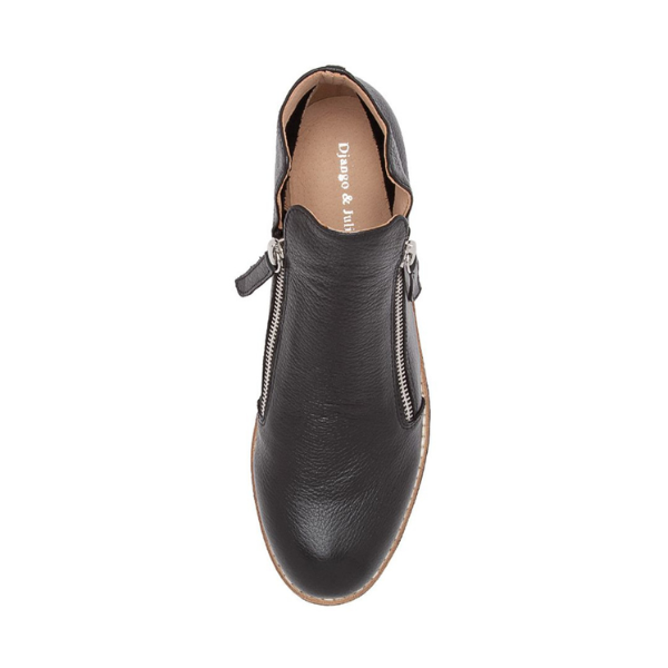 Top view of DJANGO & JULIETT Womens Ohmy Black/Black bootie in black leather with a side zipper and tan inner sole, shown on a white background—ideal comfort footwear for everyday wear.