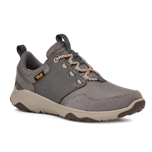 The Teva Mens Canyonview RP Grey/Burro, a gray and dark gray hiking shoe with tan and brown accents, thick textured sole, patterned laces, and low-cut design for foot pain relief, shown angled on a white background.