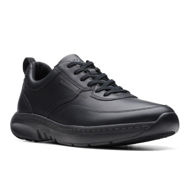 The Clarks Mens Pro Lace Black Leather sneaker by CLARKS features black laces, a comfort tech insole, thick slip-resistant sole, and subtle stitching, displayed from a front side angle on a white background.