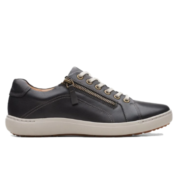The Clarks Womens Nalle Lace Wide Black/White by CLARKS is a black leather sneaker with white laces, a white sole, a gold zipper accent, and Contour Cushion footbed—shown in left side profile.