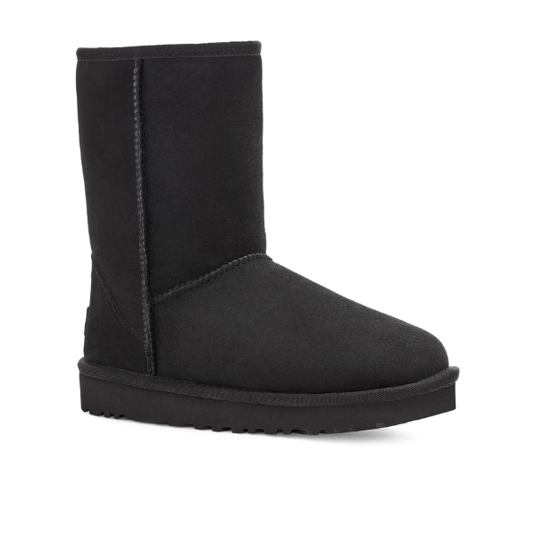 The UGG Womens Classic Short II Boot in black, featuring a rounded toe, flat sole, and mid-calf height, is displayed from a side angle on a white background.