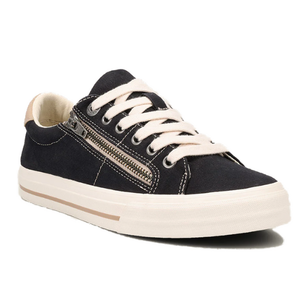 The TAOS Taos Womens Z Soul Black/Tan Distressed is a black canvas sneaker with white laces and sole, a beige heel accent, decorative silver side zipper, and a removable footbed for customizable comfort.