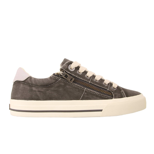 The TAOS Taos Womens Z Soul Graphite/Light Grey Distressed sneaker features gray canvas, white laces, a side zipper, white sole with black stripe, and a removable footbed for comfort—shown in a side view.