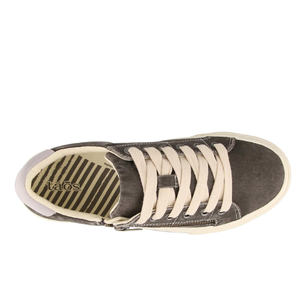 Top view of the TAOS Womens Z Soul Graphite/Light Grey Distressed sneaker with white laces, off-white sole, striped insole, arch support, and “taös” branding inside.