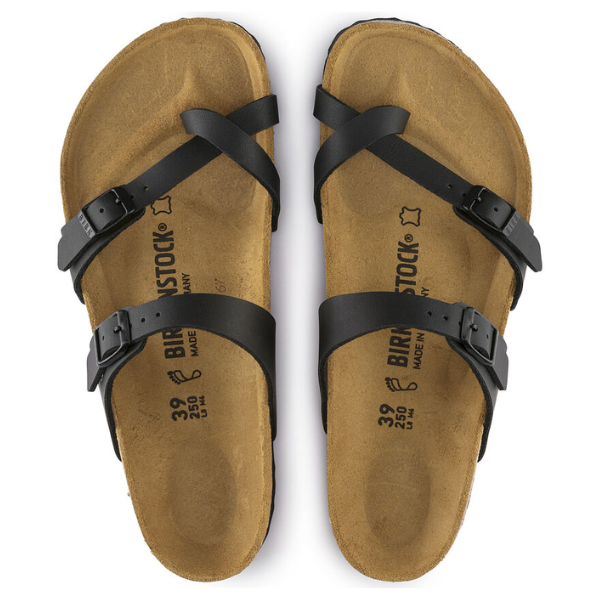 The BIRKENSTOCK Womens Mayari Birko-Flor Black Leather sandals feature cork footbeds, black crisscross straps with adjustable buckles, and are shown from above.