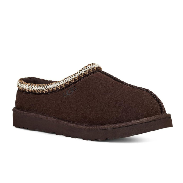 The UGG Mens Tasman Slippers Brown feature a suede upper, thick sole, decorative ankle stitching, and a subtle embossed UGG logo on the side.