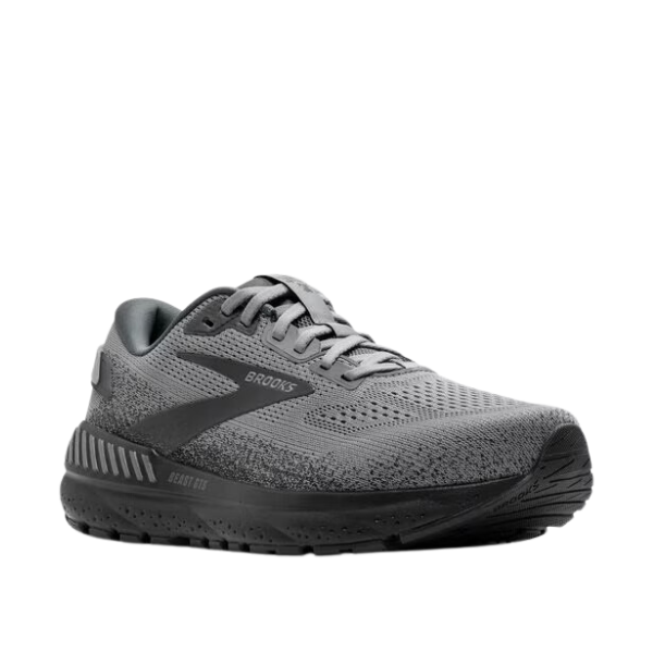 BROOKS Mens Beast GTS 24 Wide Grey running shoe features black accents, a breathable mesh upper, lace-up closure, and a thick cushioned sole for optimal support and foot pain relief. Shown on a white background.