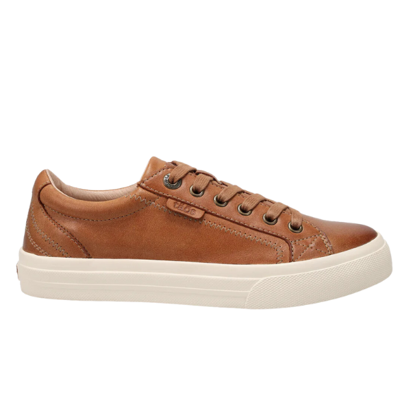 The TAOS Womens Plim Soul Lux Caramel sneaker features brown leather, matching laces, metal eyelets, a white rubber sole, and a Curves & Pods footbed, shown in side view against a plain white background.