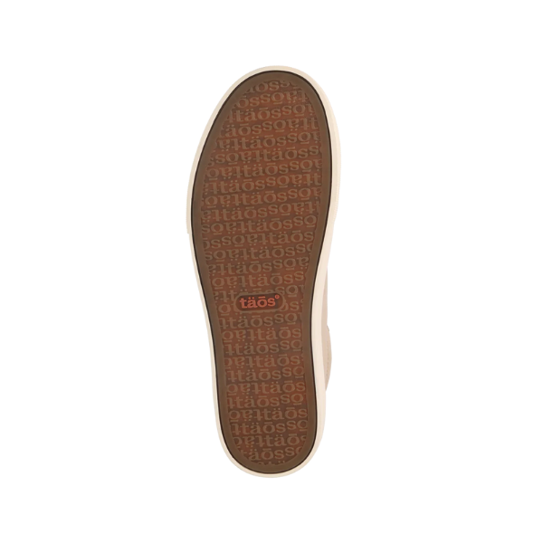 The tan and brown sole of the Taos Womens Plim Soul Lux Oyster features the TAOS brand name embossed in the tread and an orange TAOS logo at the center, designed for comfort with a Curves & Pods footbed.