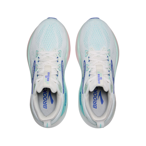 The Brooks Womens Glycerin GTS 22 Wide in White/Blue features plush cushioning, white mesh uppers, blue accents, and BROOKS printed in blue on the insoles for comfort and style.