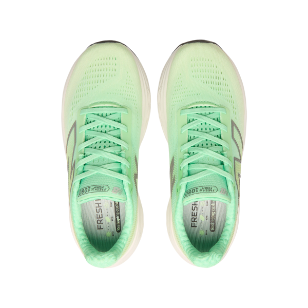 A top-down view of New Balance Womens Fresh Foam X 1080v14 Wide running shoes in white and mint green, featuring white soles and visible Fresh Foam X branding on the insoles.