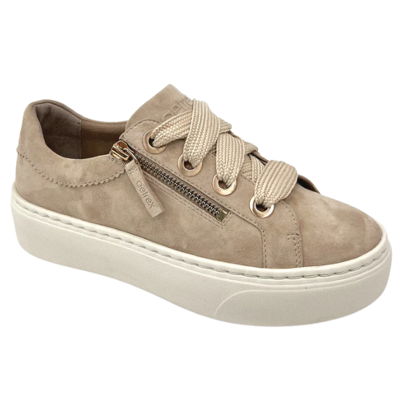 Beige sneaker with a zipper on a white background
