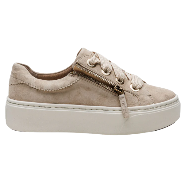 Beige sneaker with a gold zipper on a white background