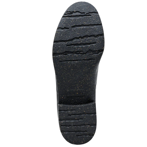 Black rubber sole of a shoe on a white background