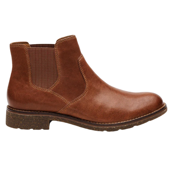 Brown leather Chelsea boot on a white background