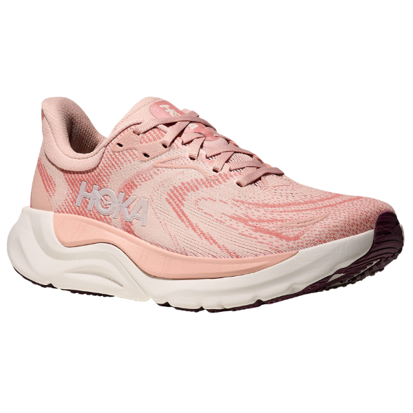 The HOKA Women's Arahi 8 Blush/Rose is a stability shoe with a blush and rose upper, white and pink cushioned sole, maroon tread, and HOKA logo—offering ideal support for overpronation.