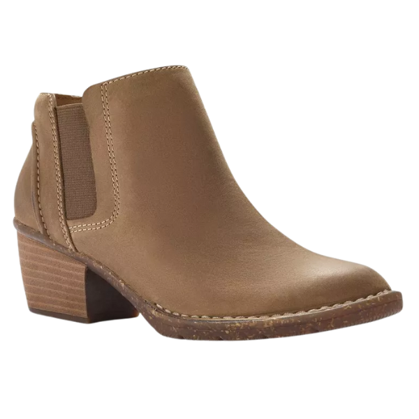 The CLARKS Women's Kastela Lo Pebble Leather ankle boot features tan leather, a low stacked heel, visible stitching, elastic side panel for easy on/off, Contour Cushion footbed, and a textured sole for grip.