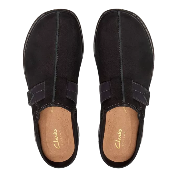 A top view of a pair of CLARKS Women's Orlene Clog Black Combination Nubuck slip-on shoes with visible stitching and tan insoles, featuring the CLARKS logo, placed side by side on a white background.
