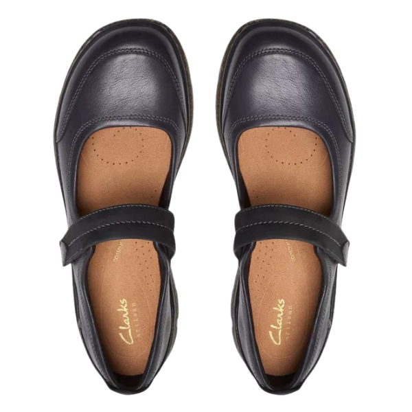 The CLARKS Women's Orlene Jane Black Leather shoes feature a rounded toe, tan cushioned insoles, a comfy footbed, and a single adjustable strap. Shown from above on a white background.