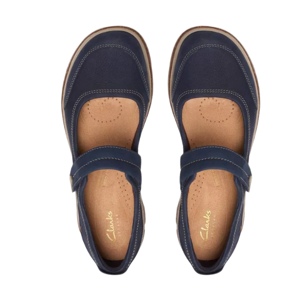 A pair of Clark's Women's Orlene Jane Navy Leather Mary Jane shoes with tan insoles and a single strap, viewed from above. The CLARKS logo is printed in gold on the insole.