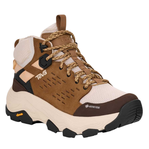 The TEVA Women's Grandview Max GORE-TEX Honey hiking boots feature a stylish mesh and leather upper, rugged sole, patterned laces, visible logos, and waterproof protection for reliability on the trails.