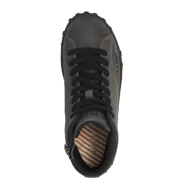 Top view of the Taos Women's Trail Mix Charcoal boot by TAOS, featuring black laces, a textured rubber sole, and a striped tan and white insole with the TAOS logo and a supportive footbed.