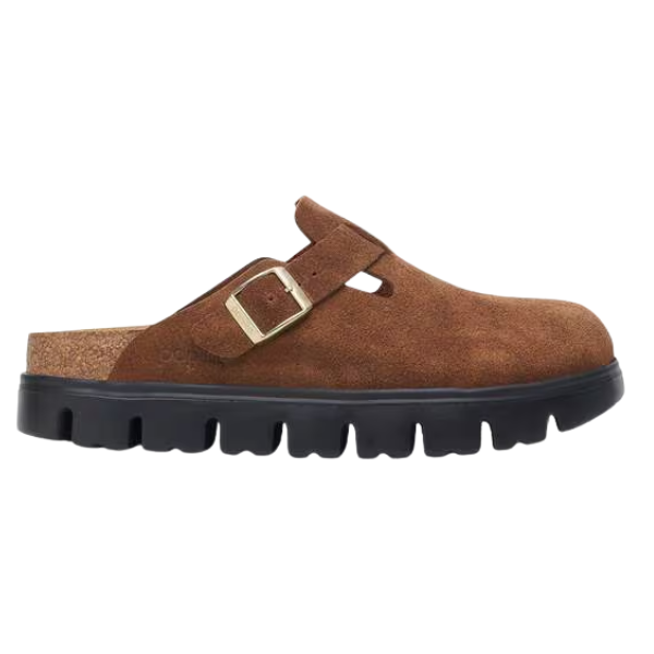 The Birkenstock Women's Boston Chunky Dark Tea clog by BIRKENSTOCK features brown suede, a thick black ridged sole, side buckle strap, open back, and a soft footbed for all-day comfort.