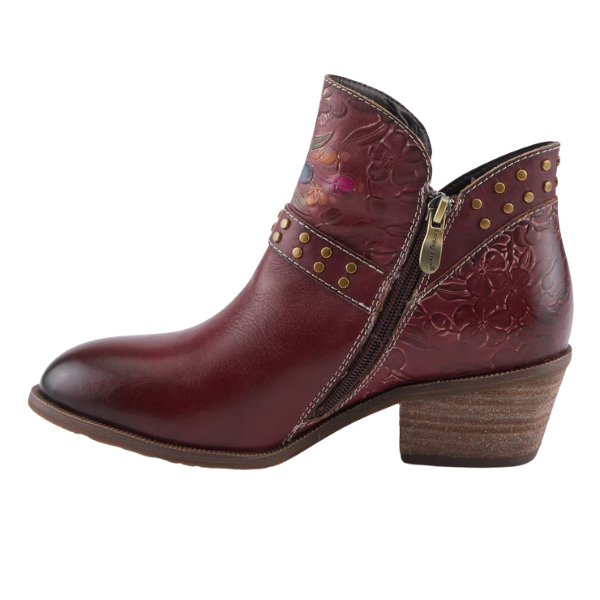 The SPRING STEP Women's Daintylady Boot Bordeaux features burgundy leather, a side zipper, floral embossing, gold studs, and a low stacked heel—chic ankle boots that add elegance to any outfit.