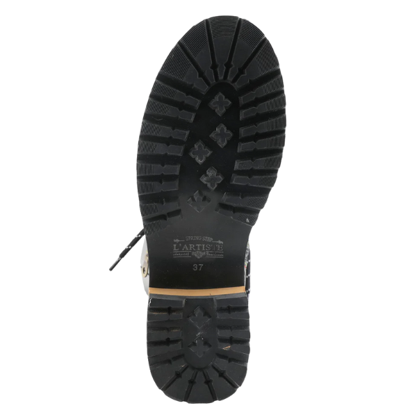 The image shows the bottom view of a single SPRING STEP Rugup Black bootie in size 37, featuring thick textured rubber treads, cross-shaped patterns, and branding text that reads SPRING STEP.