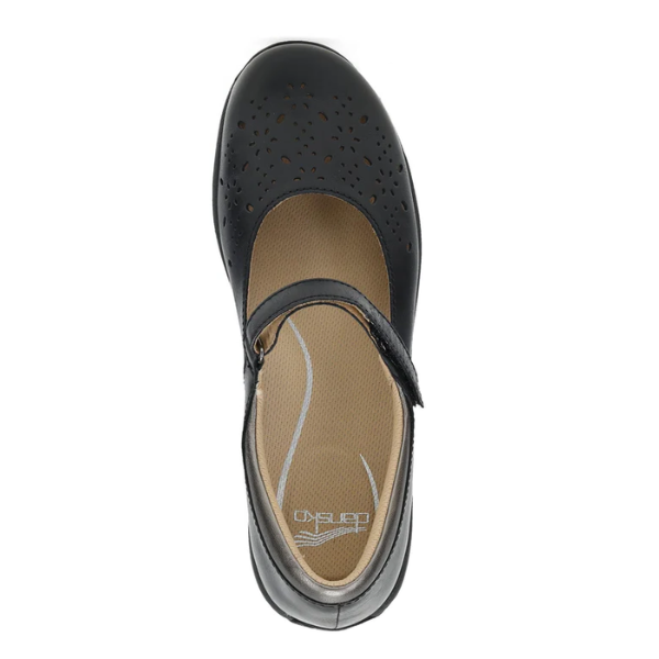 Top view of the DANSKO Women's Stacy Black Mary Jane, featuring a perforated floral toe, single instep strap, cushioned beige insole, and slip-resistant sole for comfort.