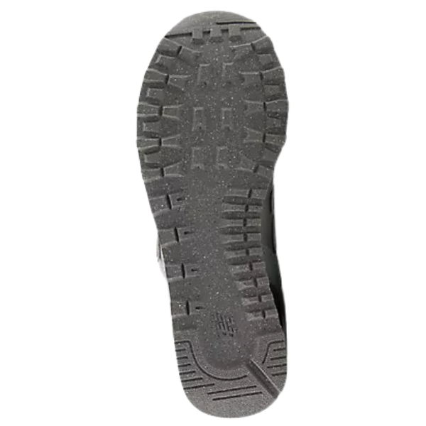 Black rugged sole with deep treads on New Balance Women's 574 Metallic Silver/Arctic Grey road trail shoe.