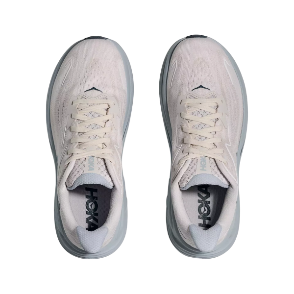 Top view of HOKA Women's Clifton 10 Wide running shoes in Grout/Blue with white laces on a white background.