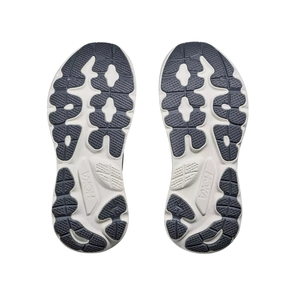 Two HOKA Men's Gaviota 6 Wide Midnight Blue shoes with white soles and black treads sit side by side on a white background.